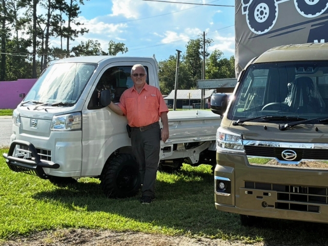 Kerry O'Steen owner of Mini Truck 4x4 with green Daihatsu Hijet Jumbo and white Regular Cab Japanese mini trucks